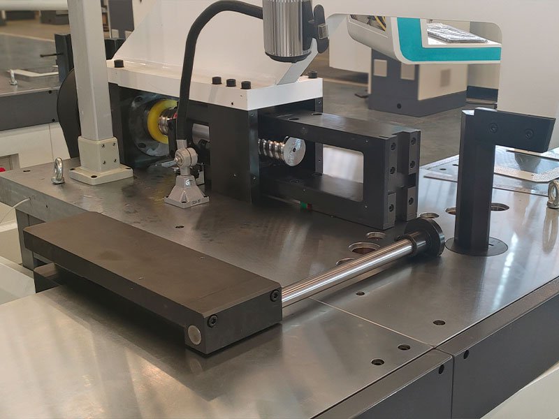 Precision backgauge for busbar